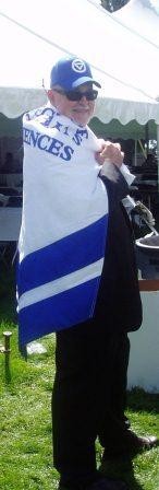 Dean Antczak draped in the CLAS banner